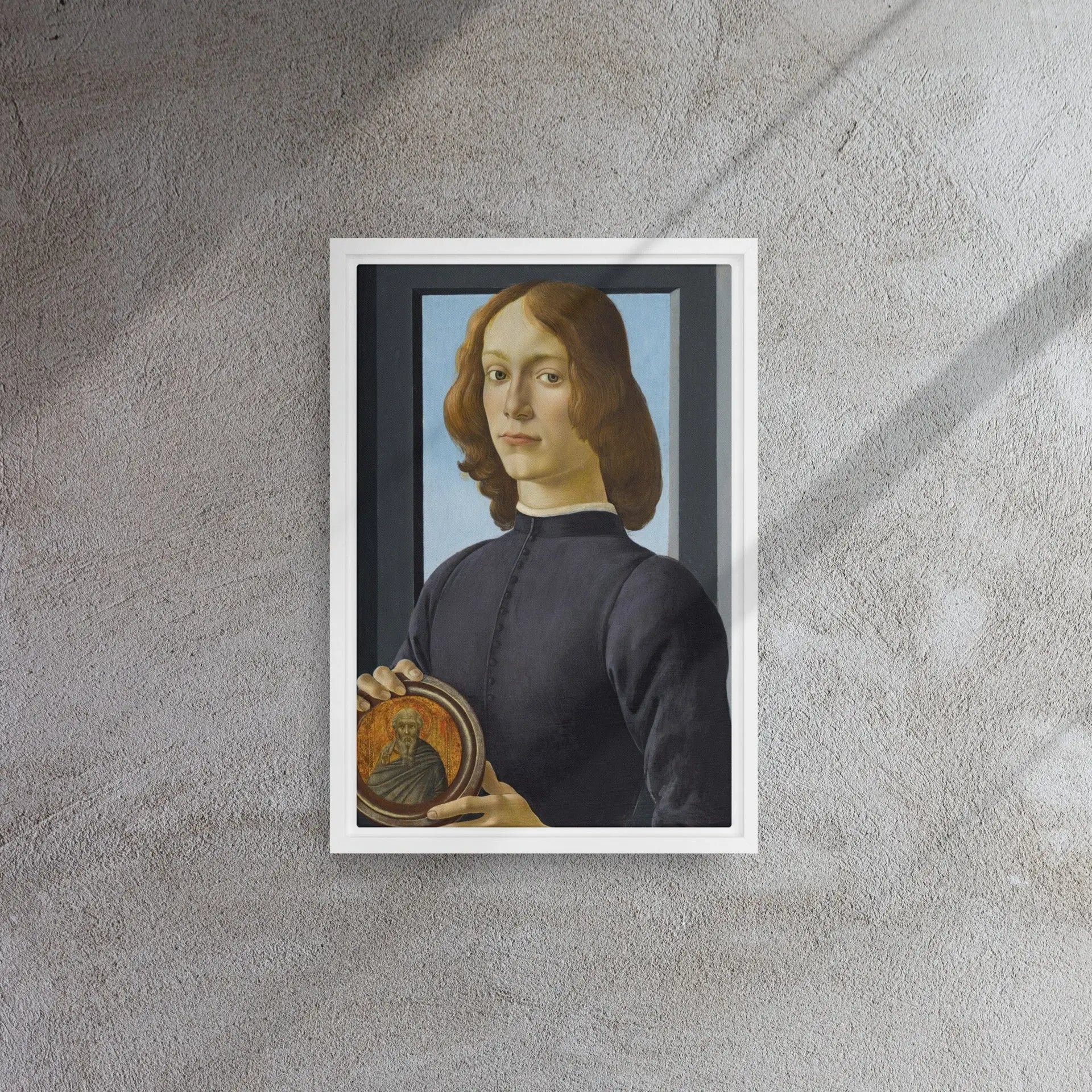 Young Man Holding a Roundel by Sandro Botticelli Framed
