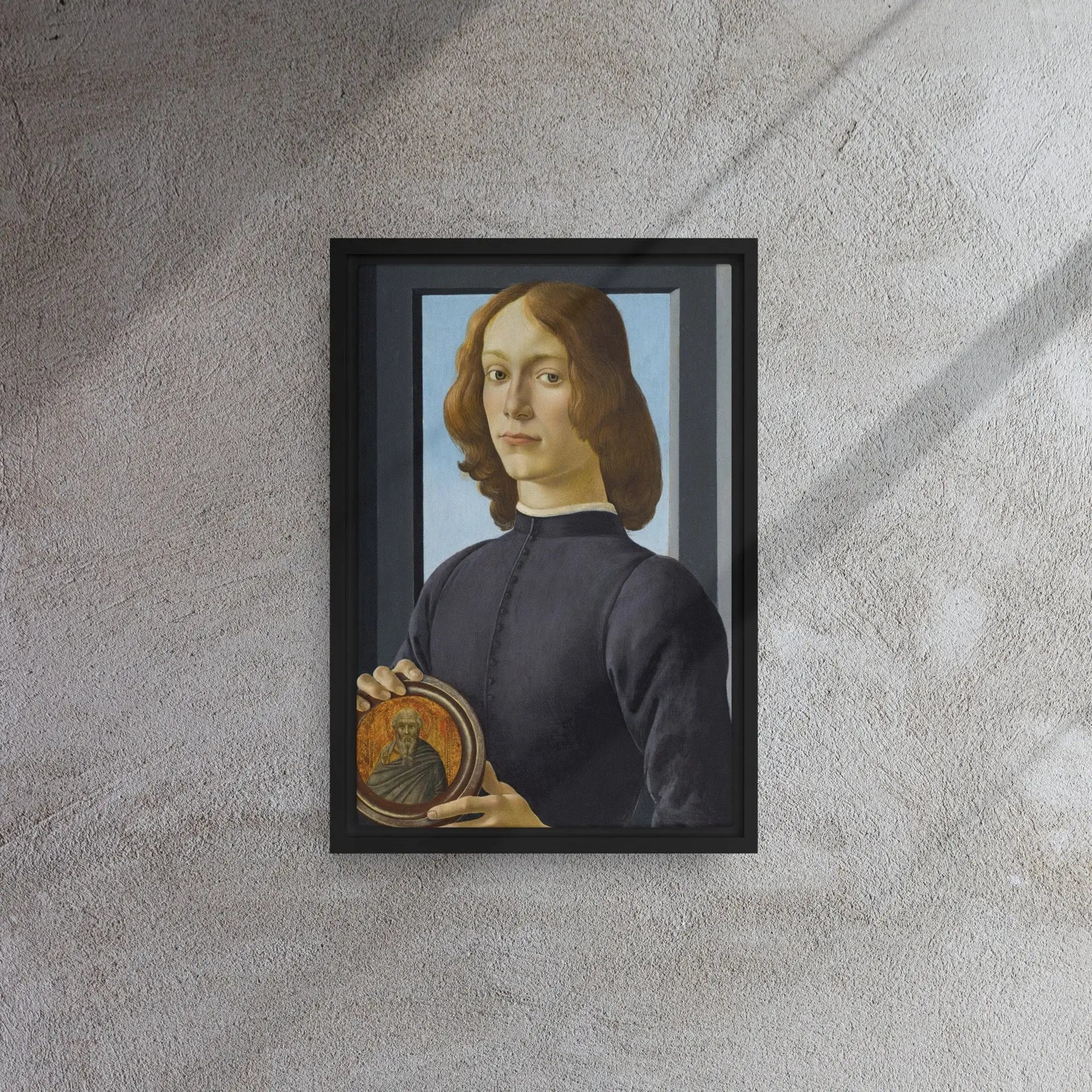 Young Man Holding a Roundel by Sandro Botticelli Framed