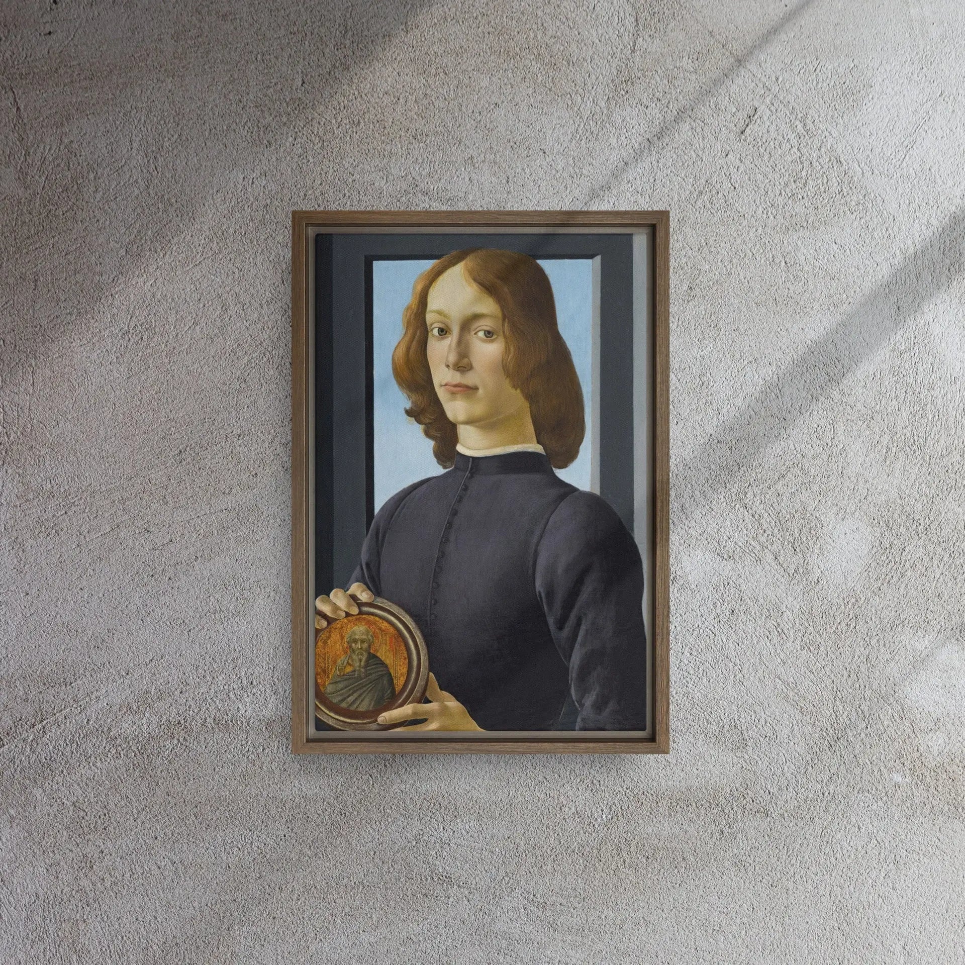 Young Man Holding a Roundel by Sandro Botticelli Framed