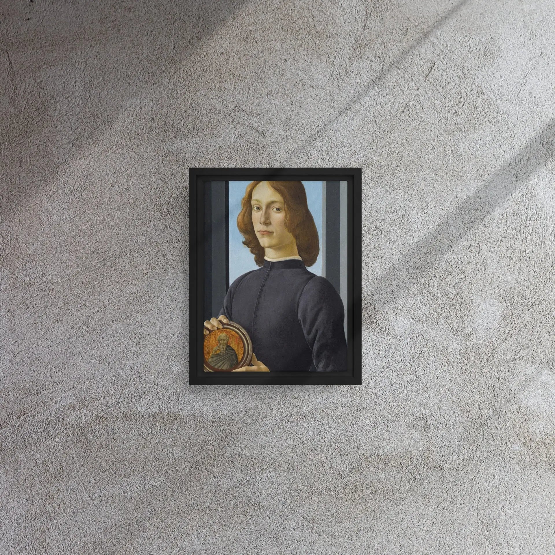 Young Man Holding a Roundel by Sandro Botticelli Framed